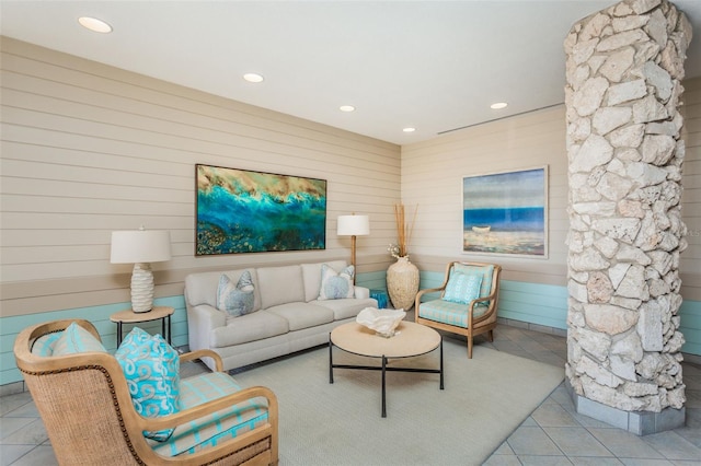 tiled living room with wooden walls