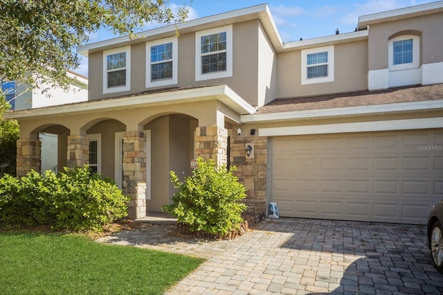 view of front of home with a garage