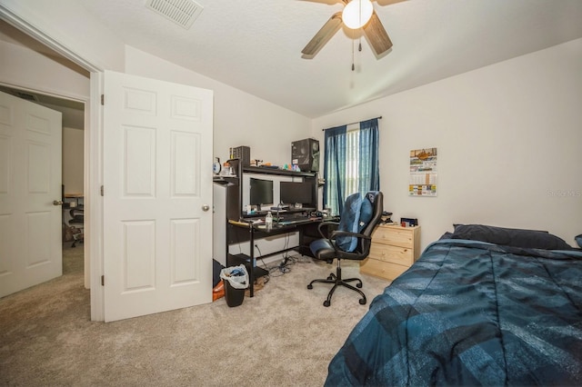 bedroom with carpet floors, ceiling fan, and lofted ceiling