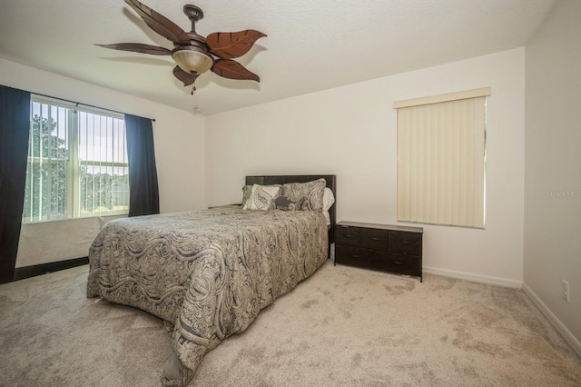 bedroom featuring carpet and ceiling fan