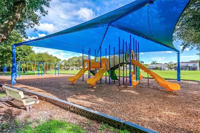 view of playground featuring a lawn