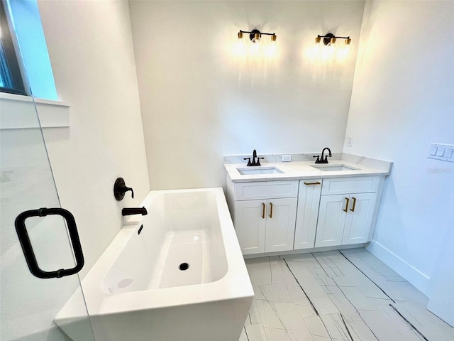 bathroom with vanity and a bathtub