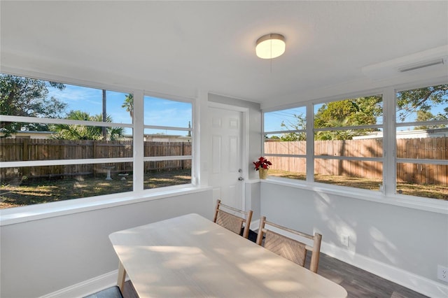 sunroom / solarium with plenty of natural light