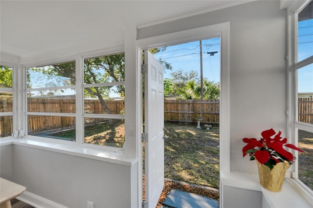 sunroom / solarium featuring a wealth of natural light