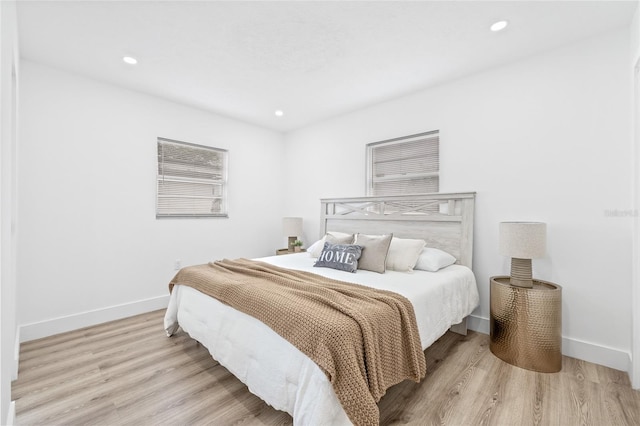 bedroom featuring light hardwood / wood-style flooring