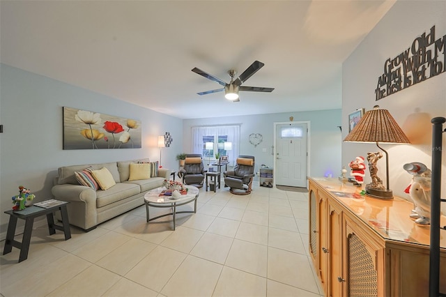 tiled living room featuring ceiling fan