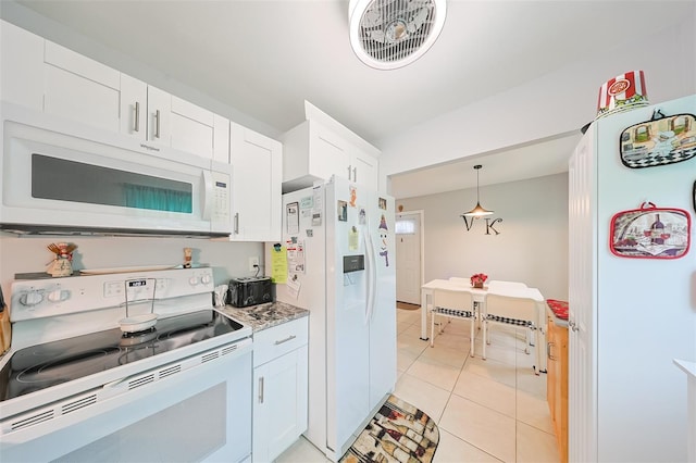 kitchen featuring light tile patterned floors, white appliances, white cabinetry, and pendant lighting