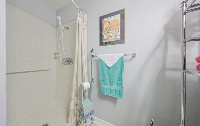 bathroom featuring walk in shower