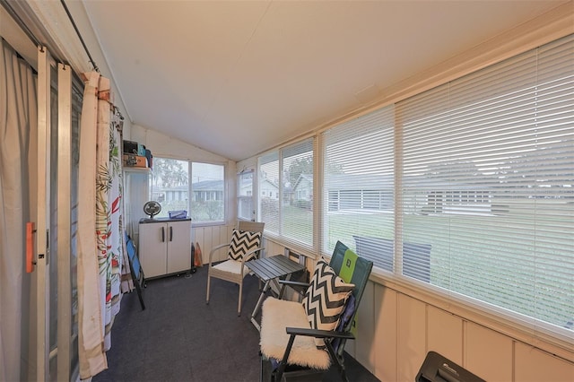 sunroom / solarium with lofted ceiling