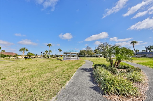 view of property's community featuring a gazebo and a lawn