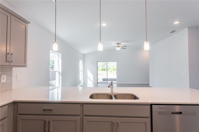 20118 Quesada Ave, Port Charlotte, FL 33952 - kitchen with dishwasher, a sink, ceiling fan, gray cabinets, and lofted ceiling