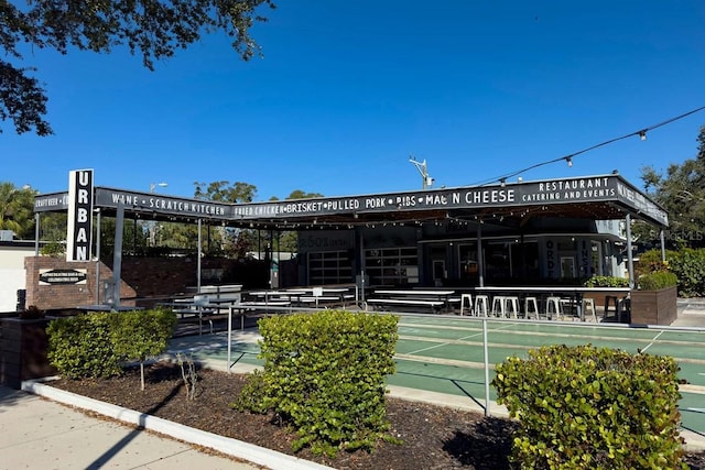 view of community with shuffleboard