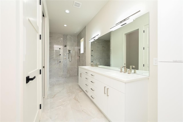 bathroom with vanity and an enclosed shower