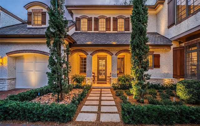 view of front of home with a garage