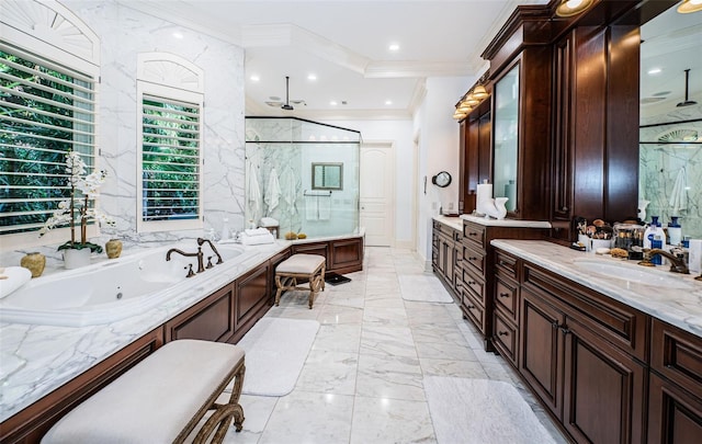 bathroom featuring vanity, ornamental molding, and independent shower and bath