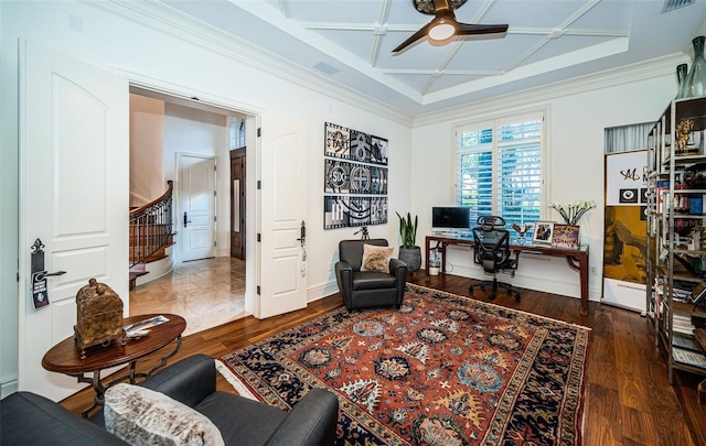 office space featuring coffered ceiling, dark hardwood / wood-style flooring, ceiling fan, and ornamental molding