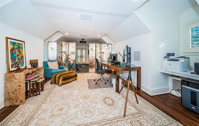 office featuring dark wood-type flooring, lofted ceiling, and french doors