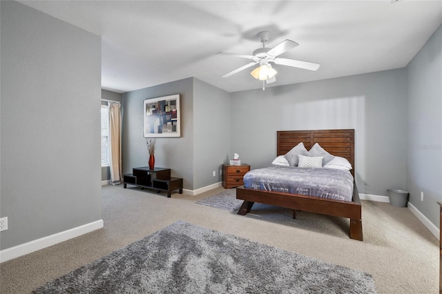 bedroom with ceiling fan and carpet floors