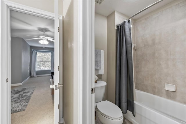 bathroom with ceiling fan, shower / bathtub combination with curtain, and toilet