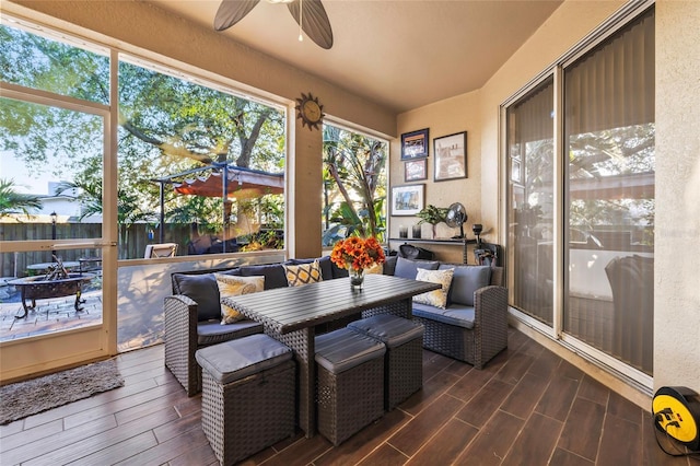 sunroom / solarium with ceiling fan