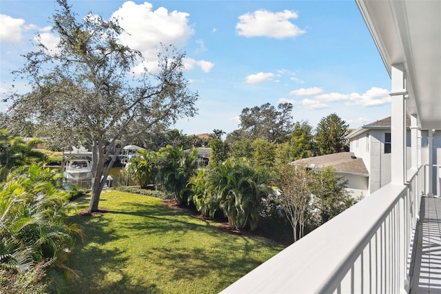 view of yard featuring a balcony