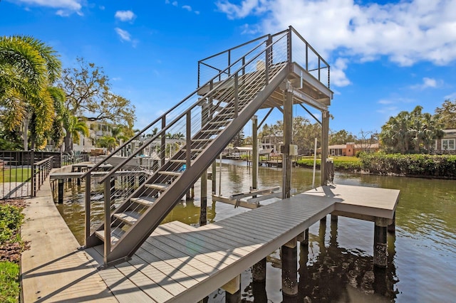 view of dock featuring a water view and boat lift