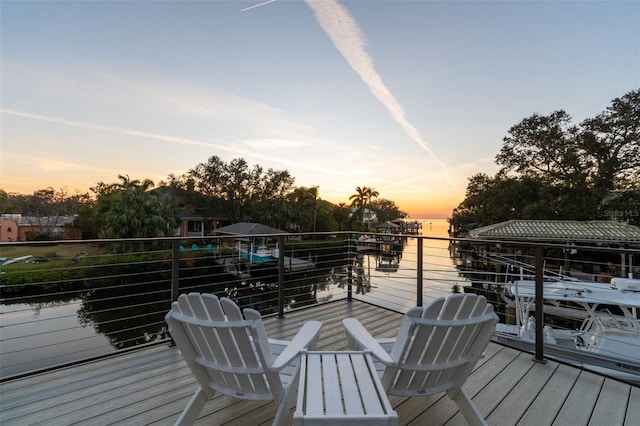 deck featuring a water view