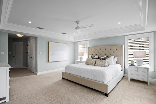 bedroom featuring light carpet, visible vents, and crown molding