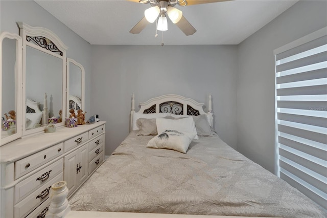 bedroom featuring ceiling fan