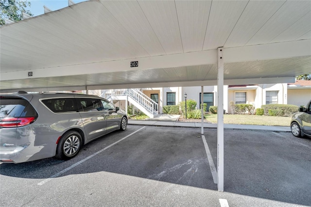 view of car parking featuring a carport