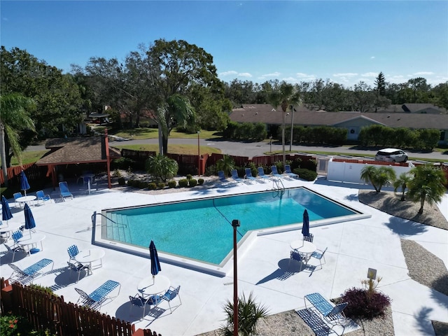 view of swimming pool featuring a patio