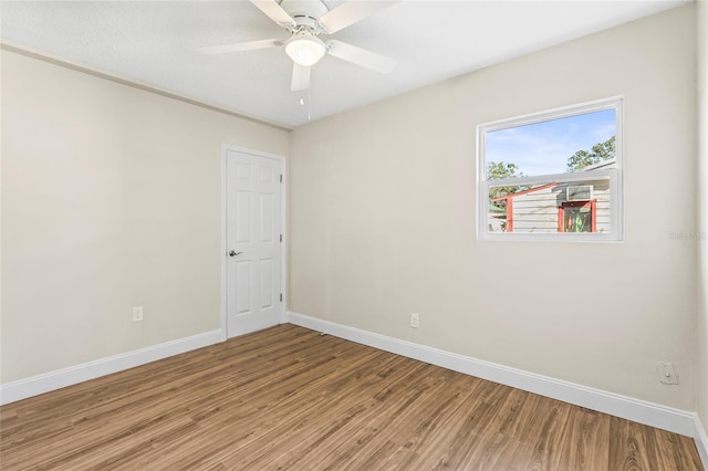 unfurnished room with light hardwood / wood-style floors and ceiling fan