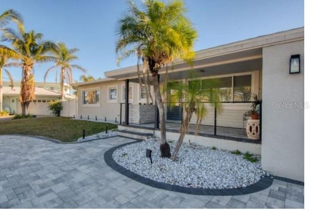 view of front of property with a front lawn