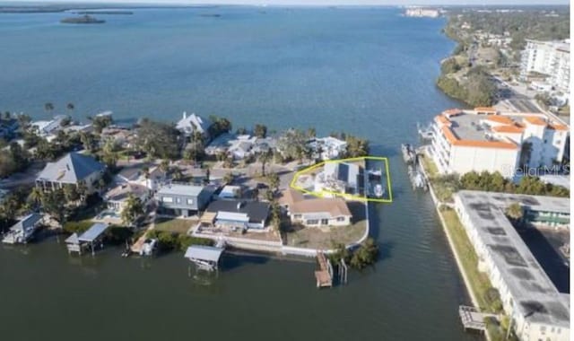 birds eye view of property featuring a water view