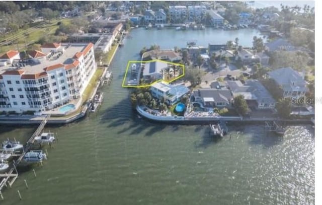 birds eye view of property featuring a water view