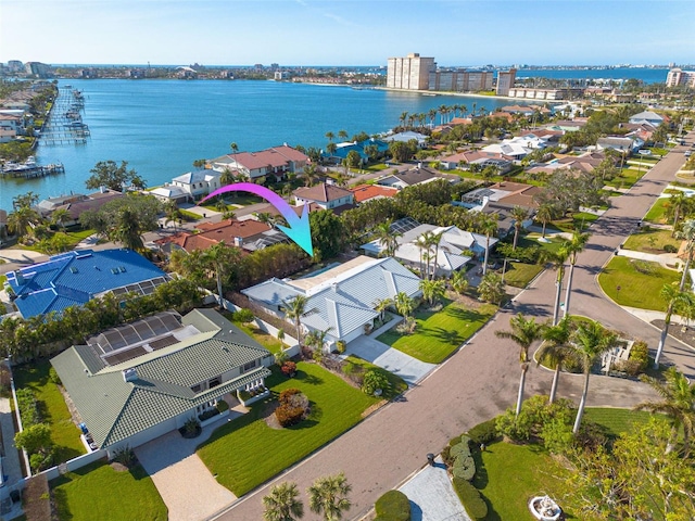 birds eye view of property featuring a water view