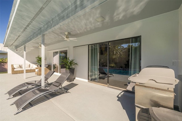 view of patio / terrace featuring ceiling fan