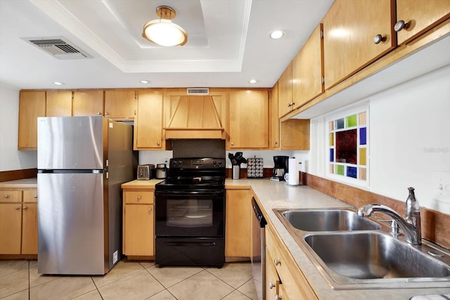 kitchen with light tile patterned flooring, sink, a tray ceiling, stainless steel appliances, and custom range hood