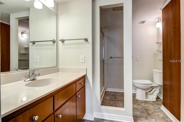 bathroom featuring toilet, vanity, and walk in shower