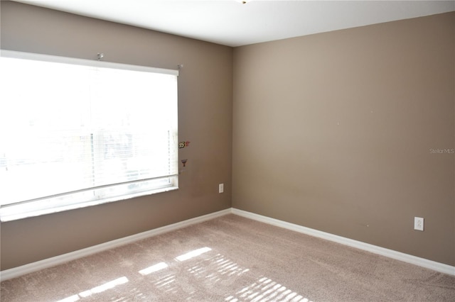 view of carpeted spare room