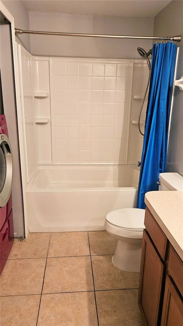 full bathroom featuring tile patterned flooring, vanity, shower / tub combo with curtain, and toilet