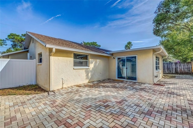 rear view of house with a patio