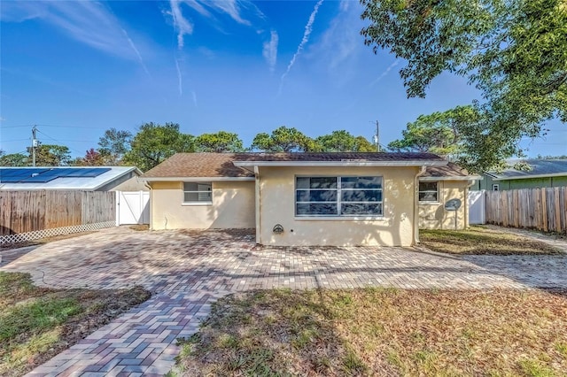 back of property featuring a patio