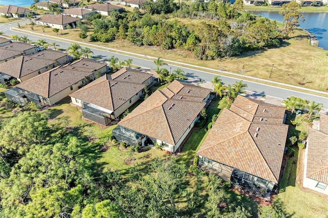 bird's eye view with a water view