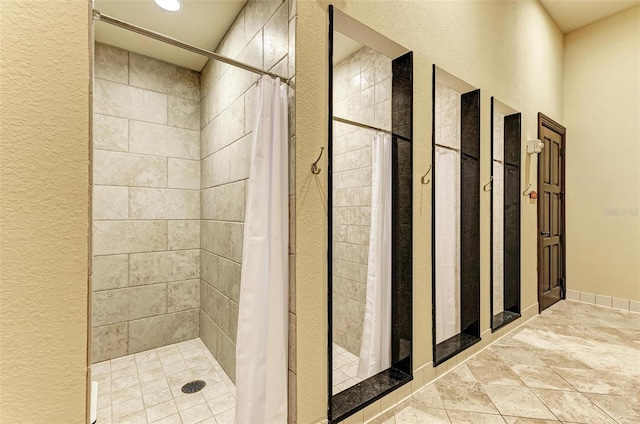 bathroom featuring curtained shower