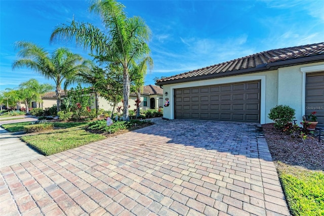 view of front of home with a garage