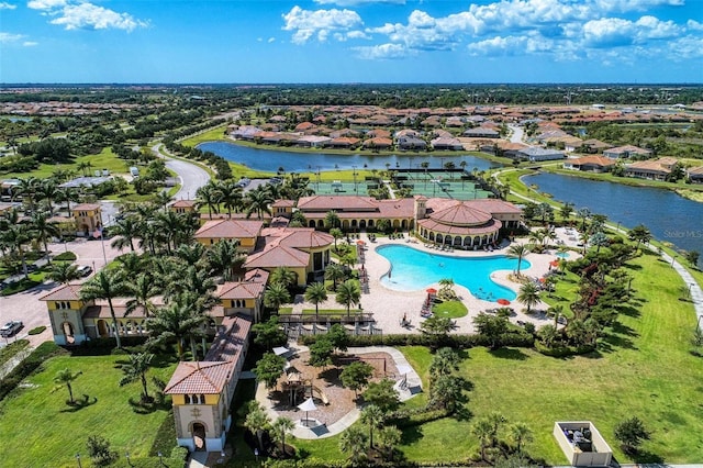 birds eye view of property featuring a water view