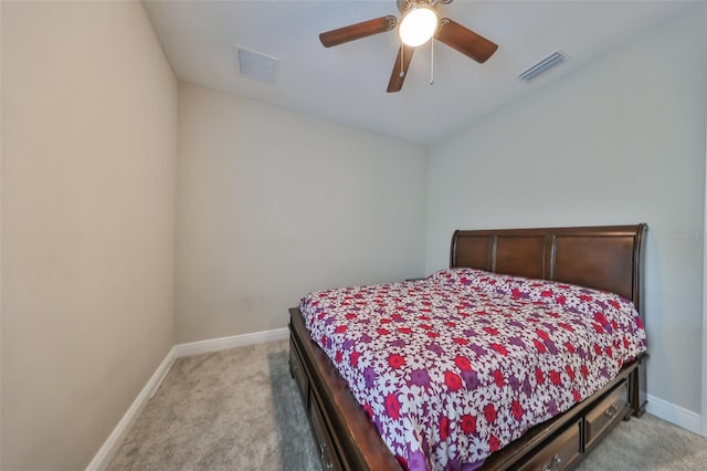 bedroom with baseboards, ceiling fan, visible vents, and light colored carpet