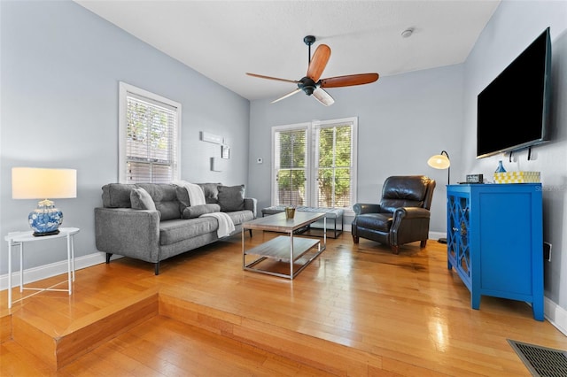408 E Amelia Ave, Tampa, FL 33602 - living room with plenty of natural light, visible vents, light wood-style flooring, and ceiling fan