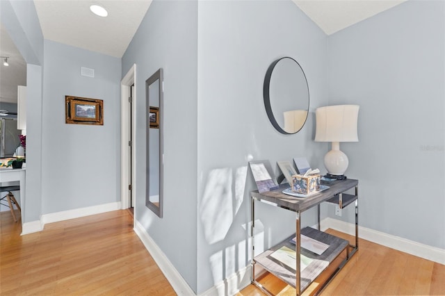 408 E Amelia Ave, Tampa, FL 33602 - corridor with baseboards and wood finished floors